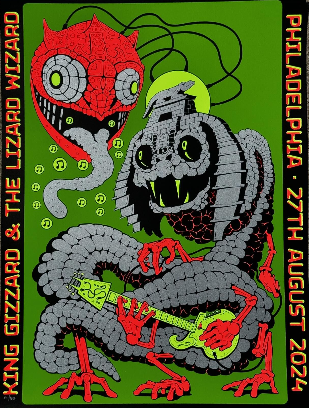 poster art by Jason Galea: a snakelike architectural monstrosity plays guitar